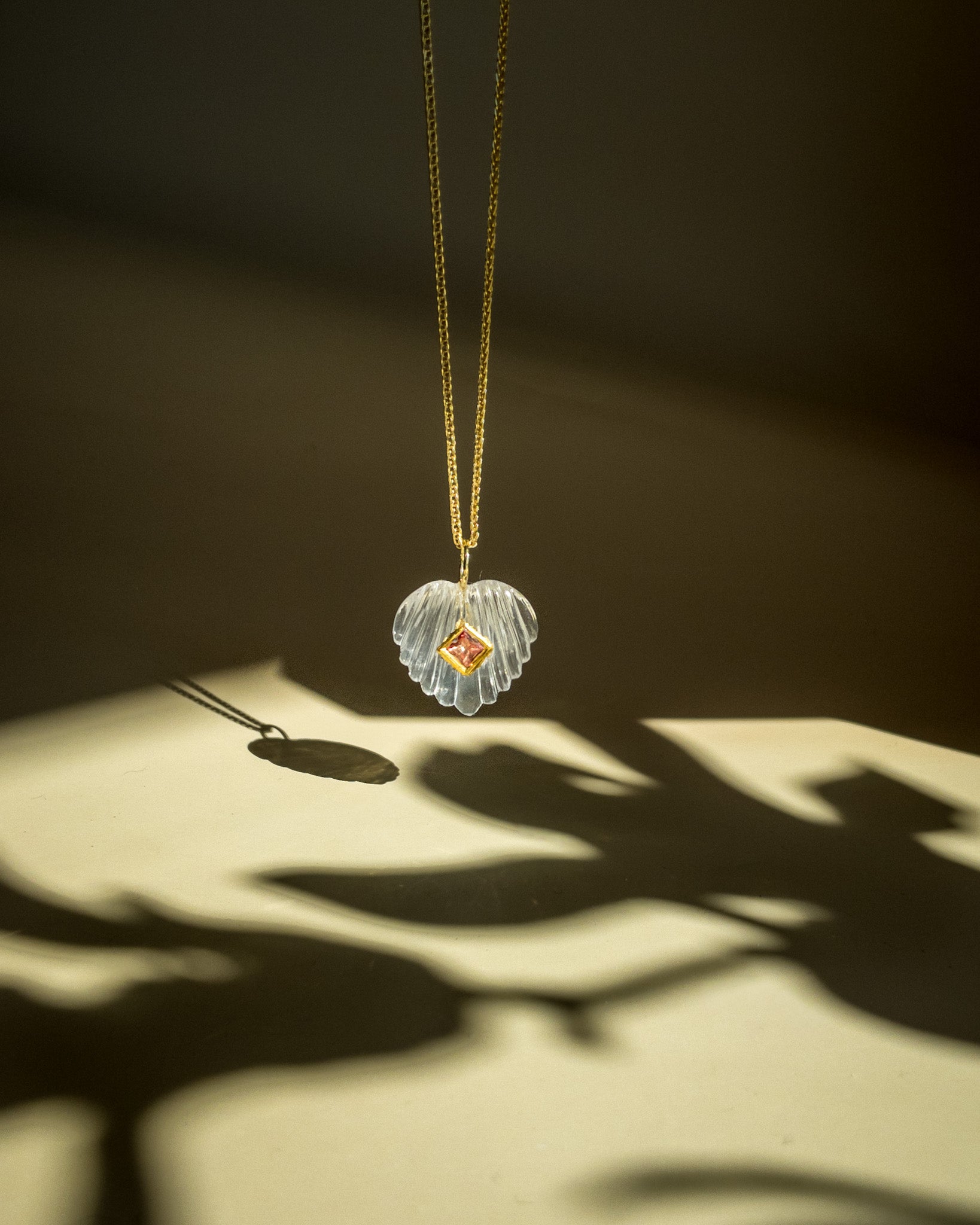 Shell of light - Hand-Carved Quartz & Tourmaline Pendant - DIVYA