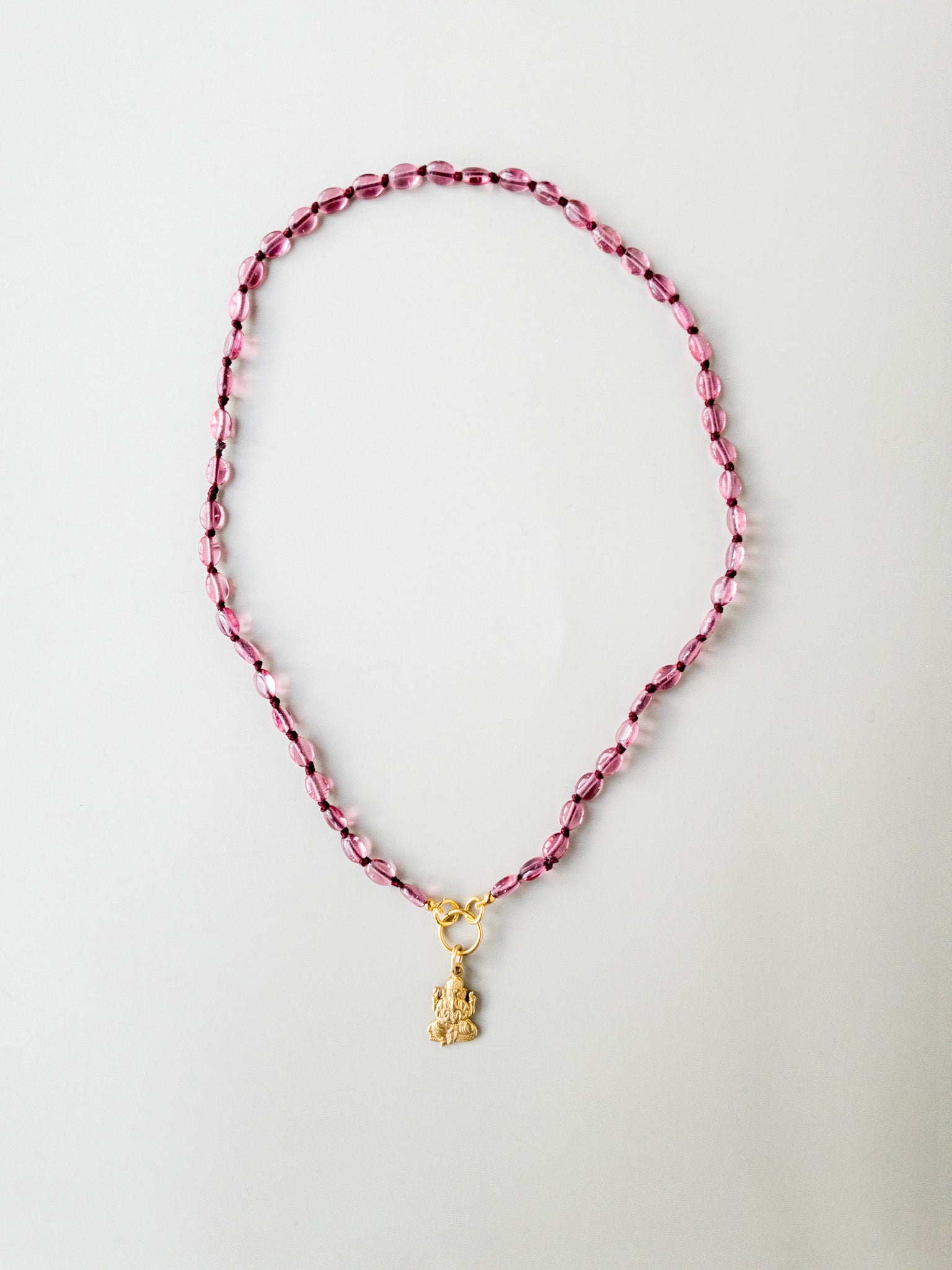 Associate your necklace with a Sacred symbol (jewels sold separately)